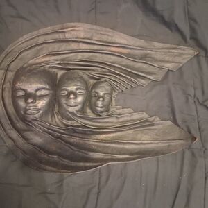 Vintage Leather Wall Art: Three Faces